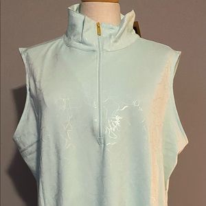 Woman’s NWT sleeveless Nancy Lopez golf shirt.